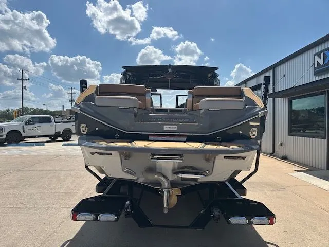 Slide: The Image of The image shows the rear of a Nautique Super Air Nautique G25 Paragon boat on a trailer. - 4