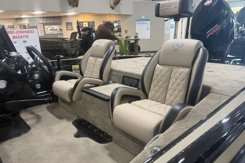 Slide: The Image of Interior of a 2027 Phoenix 721 ZXL boat with luxurious seating. - 7