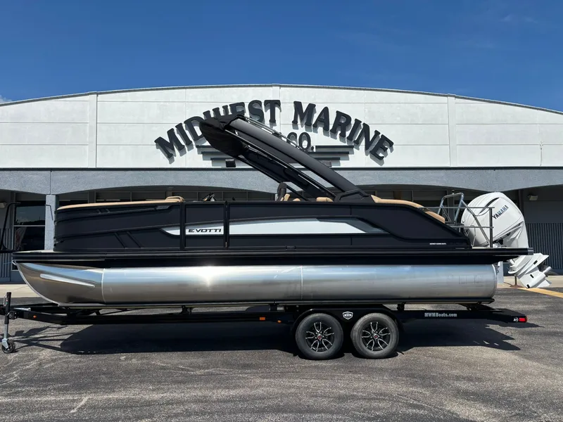 The Image of Evotti 723 CS 2027 on a trailer in front of Midwest Marine Co. - 1