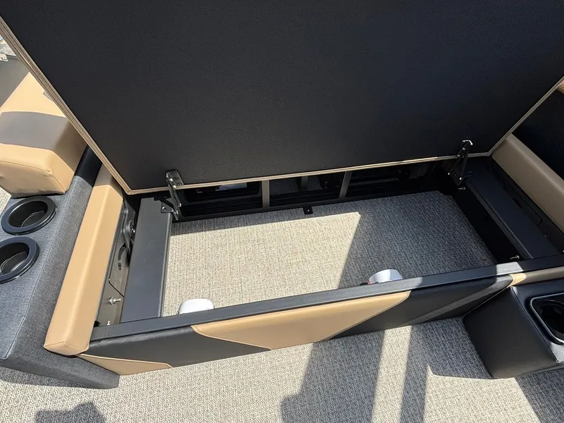 Slide: The Image of Interior view of a 2027 Evotti 723 CS with cushioned seating and cup holders. - 25