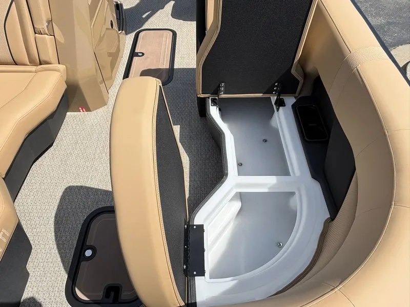 Slide: The Image of Interior of a 2027 Evotti 723 CS with beige upholstery and storage space under the seats. - 11