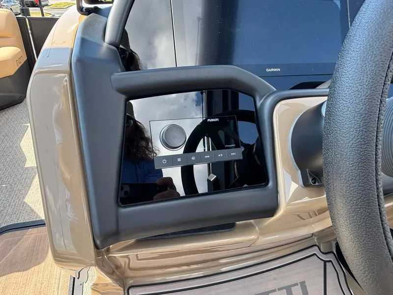 Slide: The Image of The image shows the dashboard of a 2027 Evotti 723 CS with a modern display. - 19
