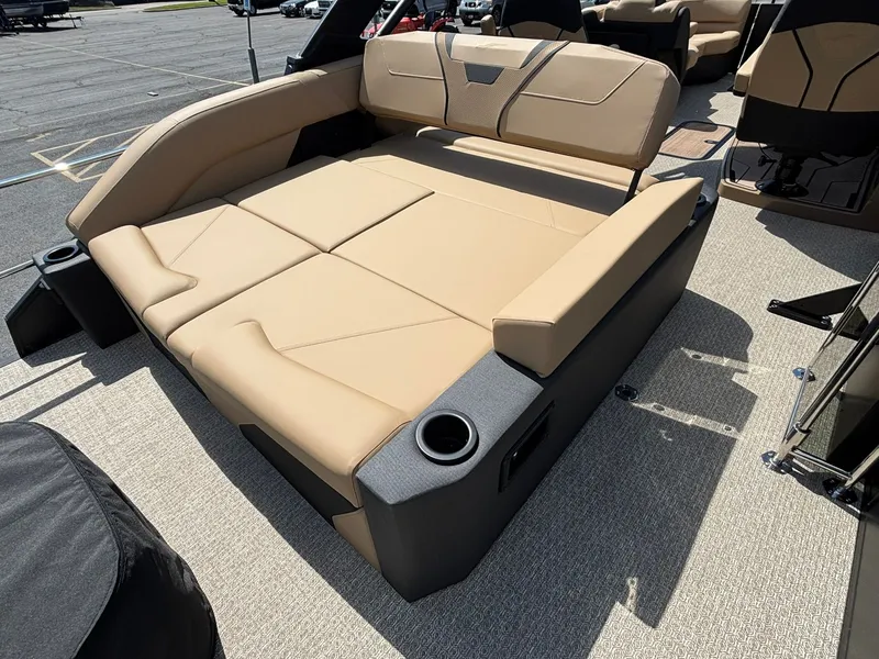 Slide: The Image of Evotti 723 CS 2027: Luxurious beige lounging area with armrests and cup holders on a boat. - 26