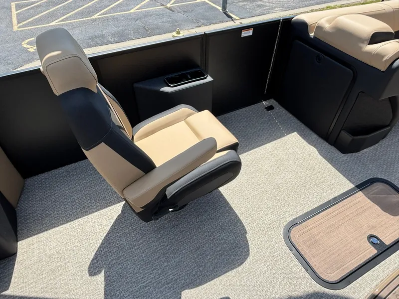 Slide: The Image of A modern boat seat in an Evotti 723 CS from 2027, featuring beige and black upholstery. - 15