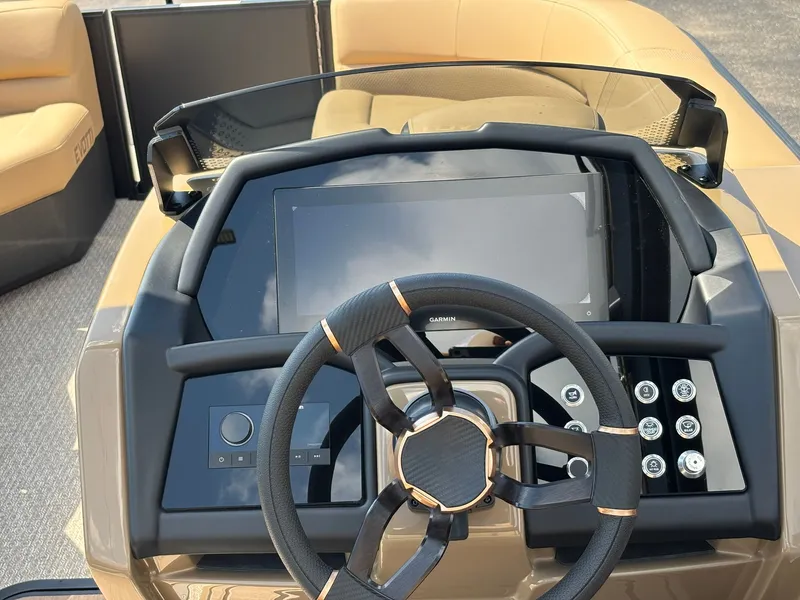 Slide: The Image of The image shows the cockpit of a 2027 Evotti 723 CS with a modern steering wheel and display. - 20