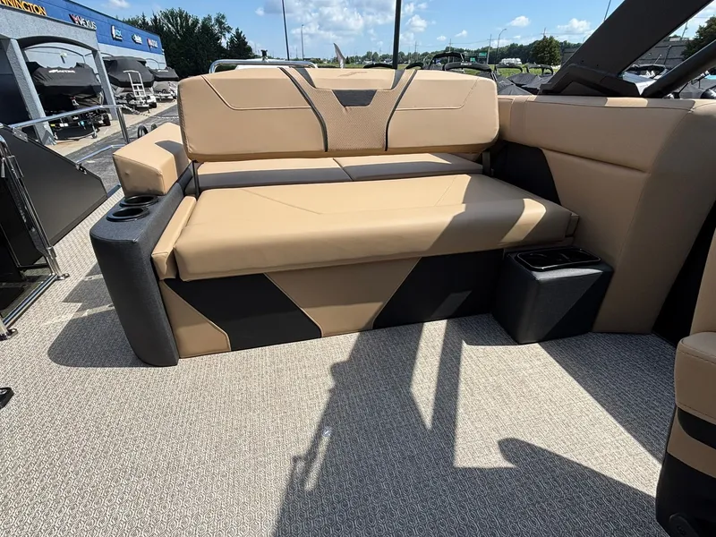 Slide: The Image of The image shows the beige and black seating area of an Evotti 723 CS from 2027. - 24
