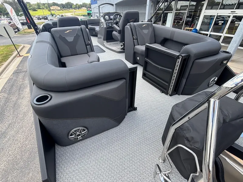 Slide: The Image of The image shows the interior of a 2027 Evotti 521 QL with luxurious black seating. - 30