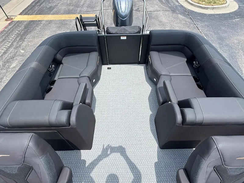 Slide: The Image of The image shows the spacious cockpit of a 2027 Evotti 521 QL with black upholstered seating. - 25
