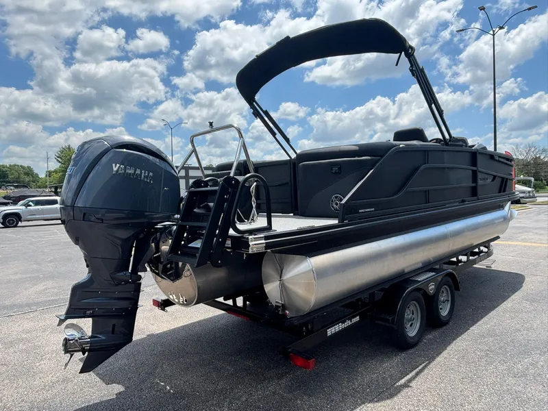 Slide: The Image of Evotti 521 QL 2027: Sleek pontoon boat with black design and powerful outboard motor. - 6