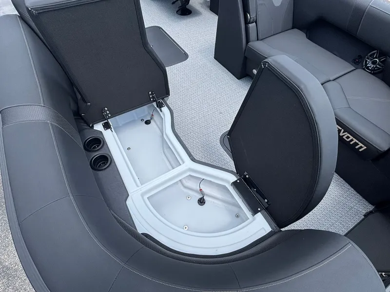 Slide: The Image of The image shows the interior of a 2027 Evotti 521 QL boat with open storage compartments. - 11
