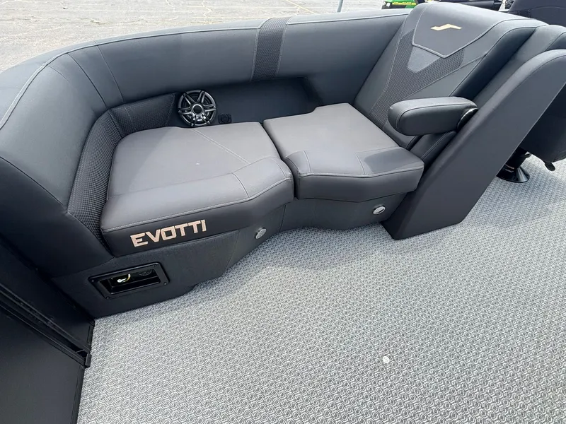 Slide: The Image of Luxurious black seating area on an Evotti 521 QL boat, featuring a speaker and stylish design. - 27