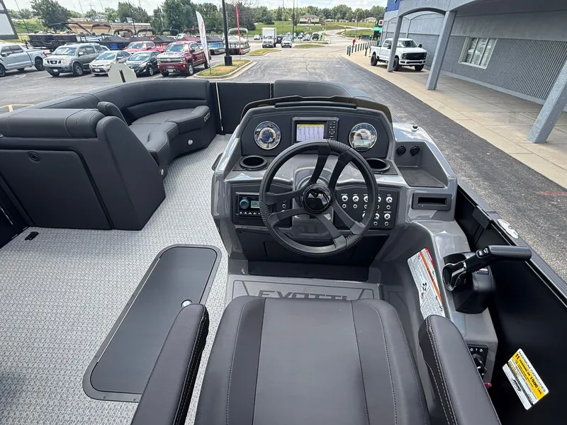 Slide: The Image of The image shows the cockpit of a 2027 Evotti 521 QL with modern instruments and gray seating. - 20