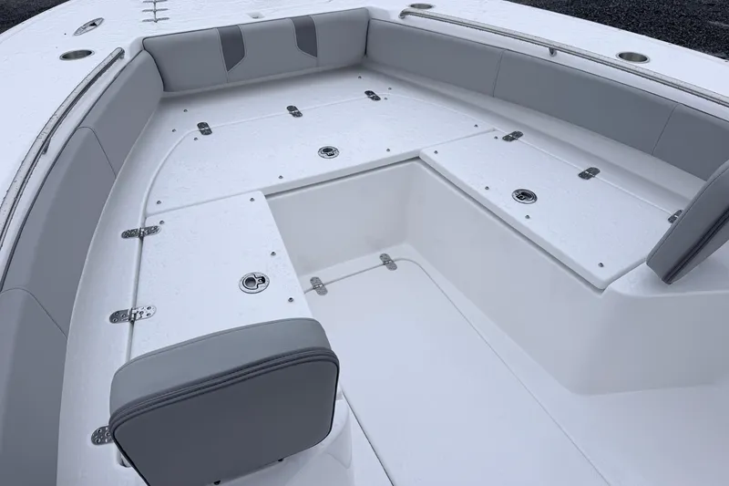 Slide: The Image of 2026 Cape Horn 28XS boat interior with spacious seating and storage compartments. - 10
