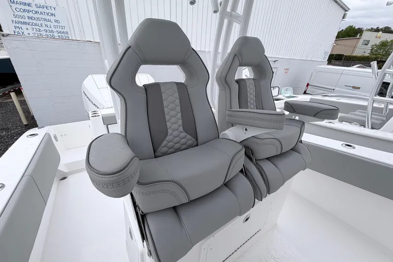 Slide: The Image of Luxurious seating on 2026 Cape Horn 28XS boat, featuring sleek gray upholstery and ergonomic design. - 16