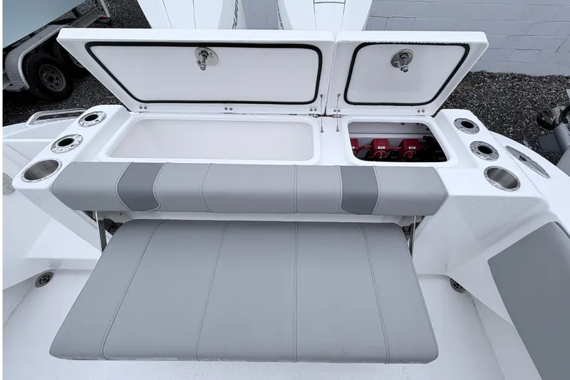 Slide: The Image of 2026 Cape Horn 28XS boat interior with storage compartments and seating. - 5