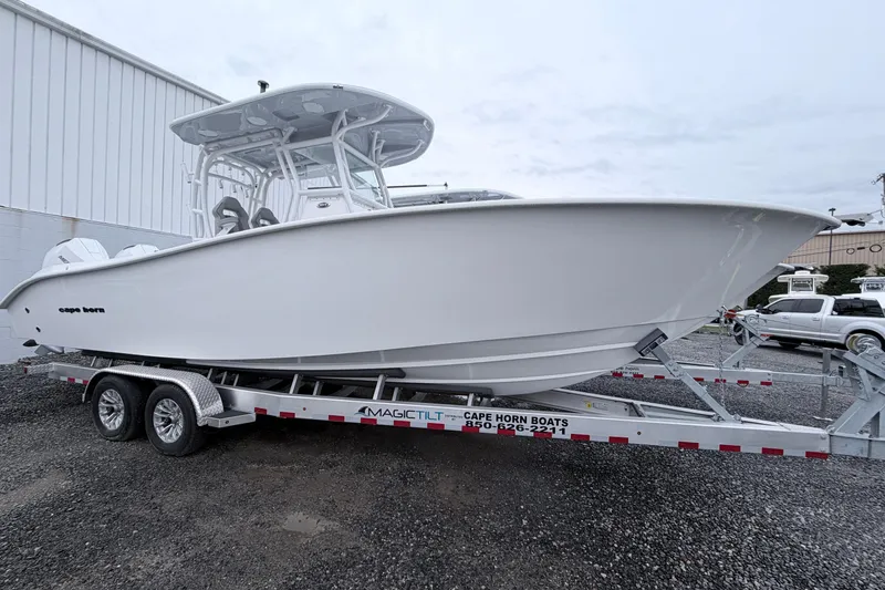 The Image of 2026 Cape Horn 28XS boat on trailer, parked outdoors. - 0