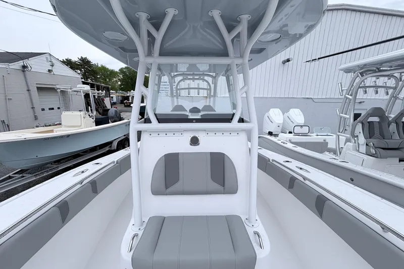 Slide: The Image of 2026 Cape Horn 28XS boat interior with sleek seating and modern design. - 13