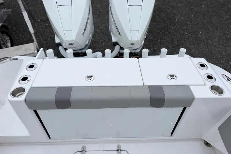 Slide: The Image of 2026 Cape Horn 28XS boat with dual Mercury engines and rod holders. - 5