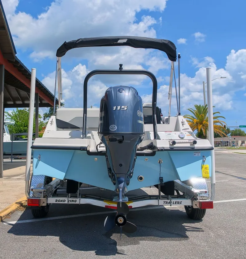 Slide: The Image of The image shows a 2027 Starcraft SV 18 OB boat on a trailer. - 3