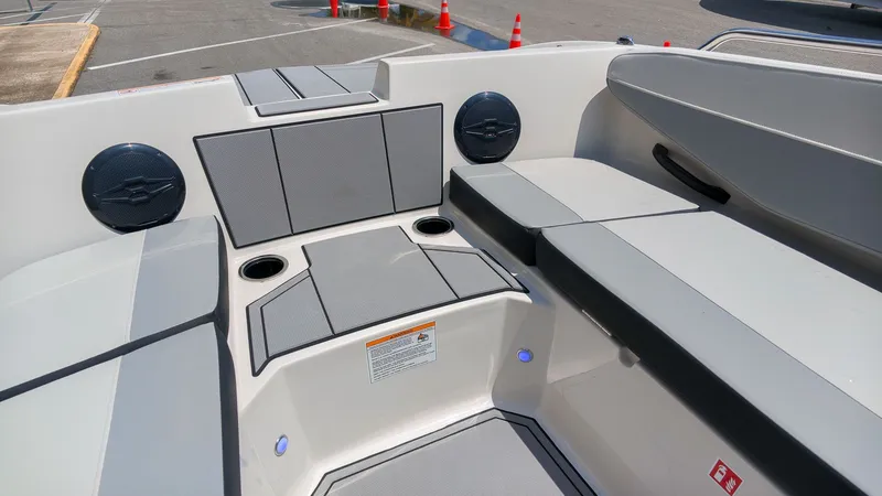 Slide: The Image of The image shows the seating area of a 2027 Starcraft SV 18 OB boat. - 14