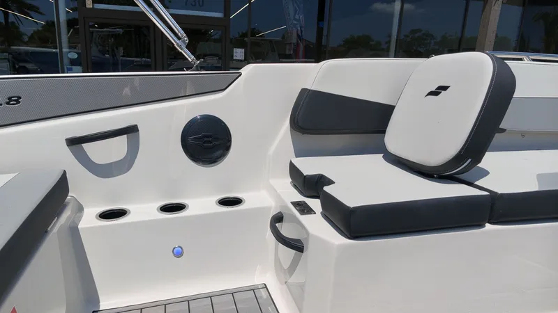 Slide: The Image of The image shows the seating area of a 2027 Starcraft SV 18 OB boat. - 11