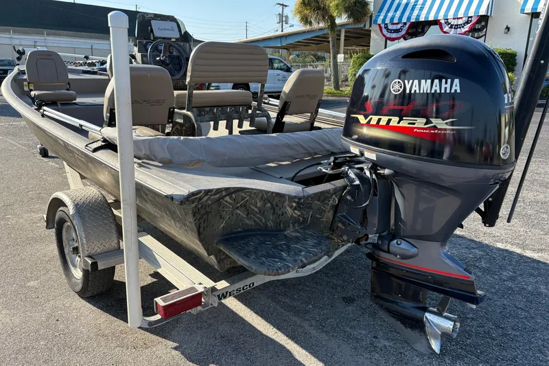 Slide: The Image of 2019 War Eagle 961 Blackhawk boat with Yamaha VMAX engine on trailer. - 1