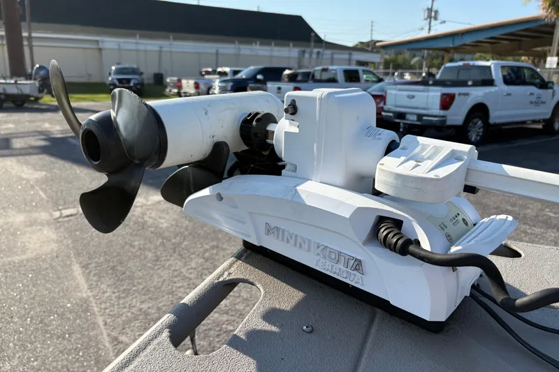 Slide: The Image of Minn Kota Terrova trolling motor on 2019 War Eagle 961 Blackhawk boat, parked outdoors. - 16