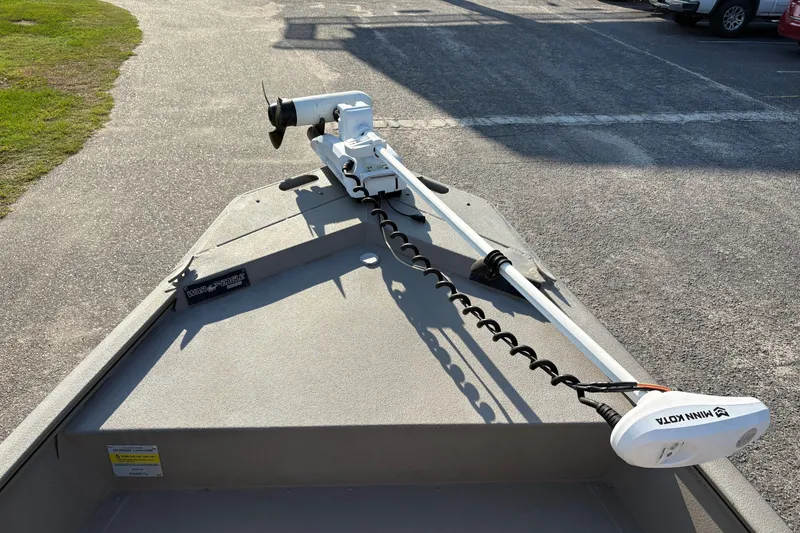Slide: The Image of 2019 War Eagle 961 Blackhawk boat with Minn Kota trolling motor on a sunny day. - 14
