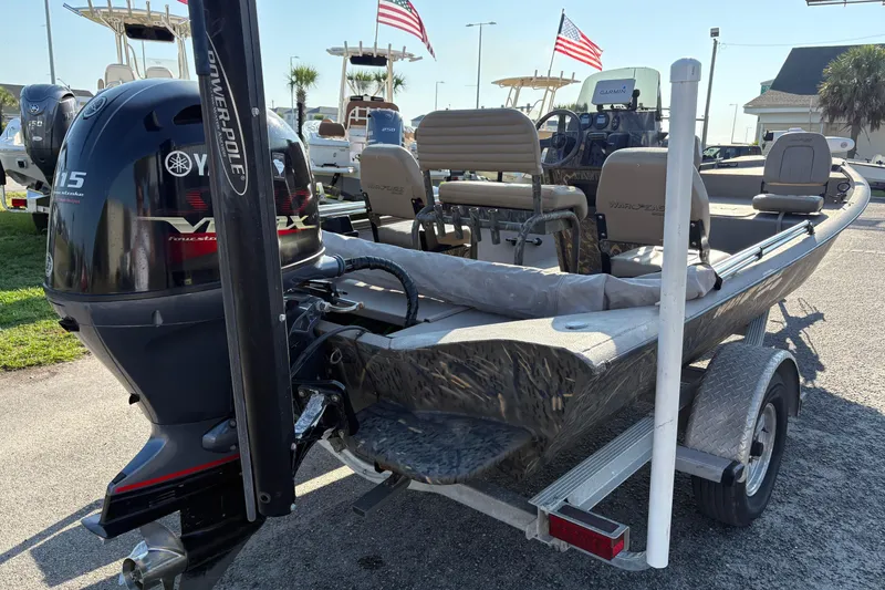 Slide: The Image of 2019 War Eagle 961 Blackhawk boat with Yamaha VMAX engine on trailer. - 2