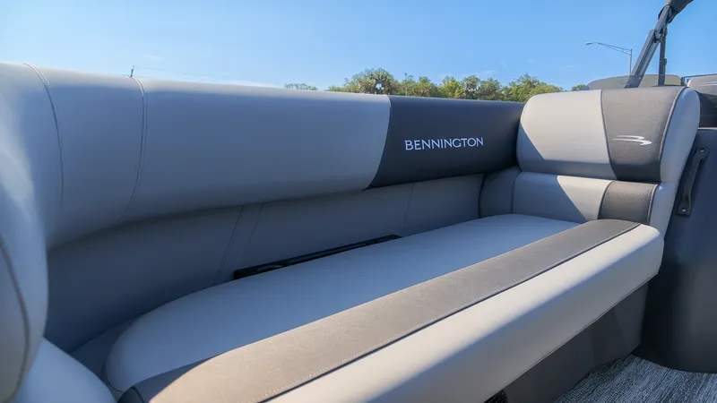 Slide: The Image of The gray upholstered bench on the Bennington 21 S Swingback offers comfortable seating. - 18