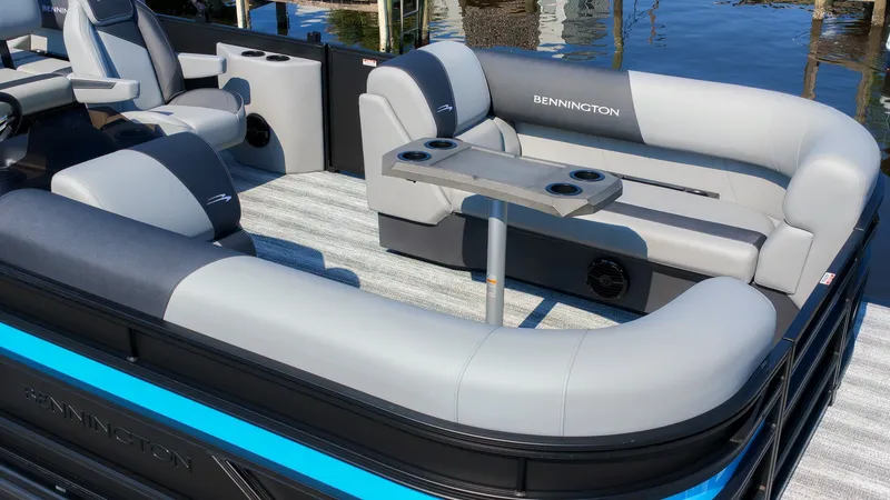 Slide: The Image of The image shows the stylish and modern interior of a Bennington 21 S Swingback pontoon boat. - 8