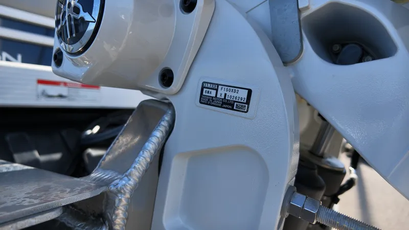Slide: The Image of Close-up of a boat detail with a manufacturer label and metal components. - 21