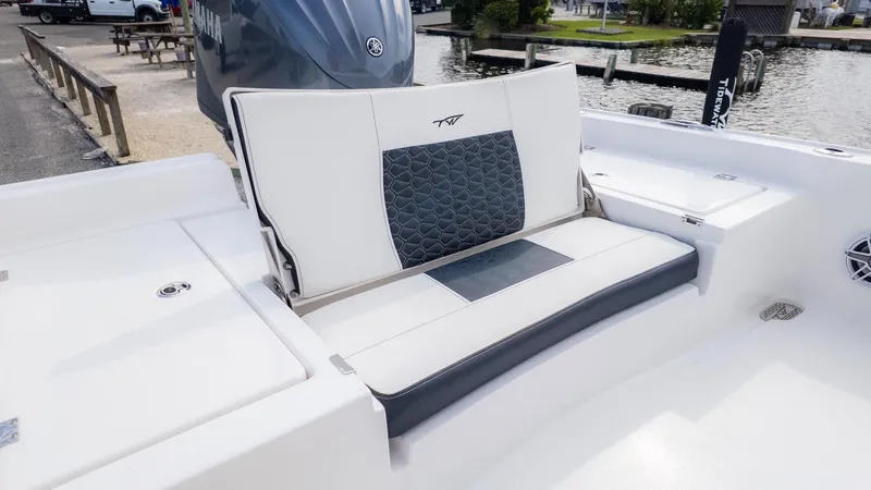 Slide: The Image of The 2026 Tidewater 2210 Carolina Bay features a stylish bench seat with a modern design. - 5