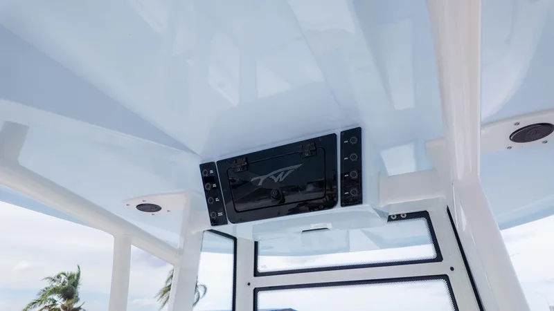 Slide: The Image of The image shows a boat's roof with built-in speaker system and windows. - 8