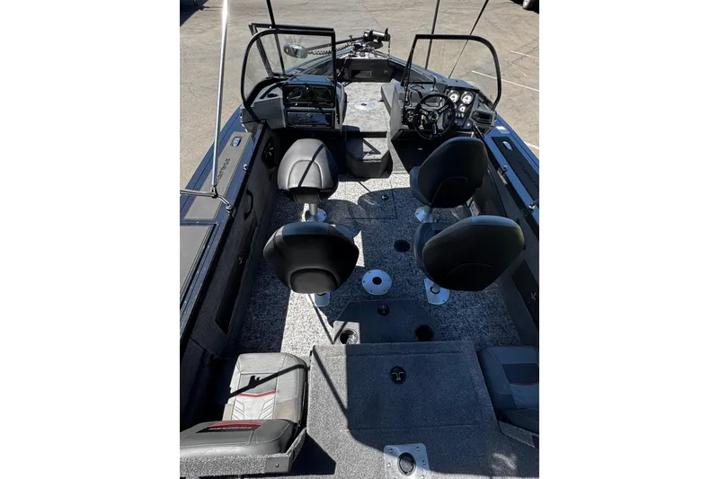 Slide: The Image of 2026 Tracker Targa V-19 Combo boat interior with seating and control panel. - 6