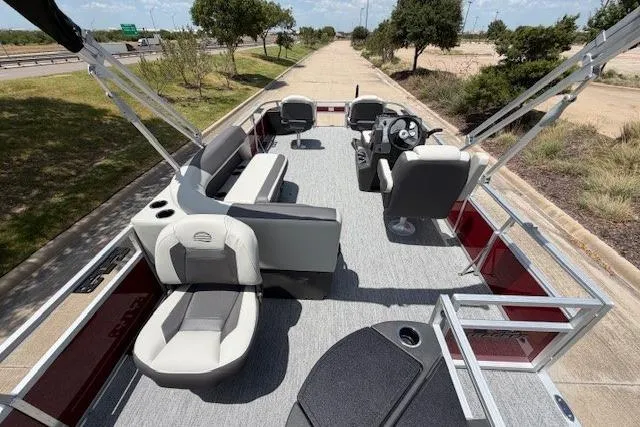 Slide: The Image of 2026 Sun Tracker Bass Buggy 18 DLX pontoon boat with spacious seating and modern design. - 11
