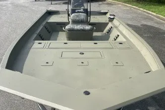 Slide: The Image of 2026 Tracker Grizzly 2072 CC boat with spacious deck and seating. - 7