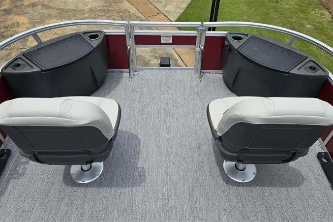 Slide: The Image of 2026 Sun Tracker Bass Buggy 18 DLX pontoon boat interior with two swivel seats. - 8