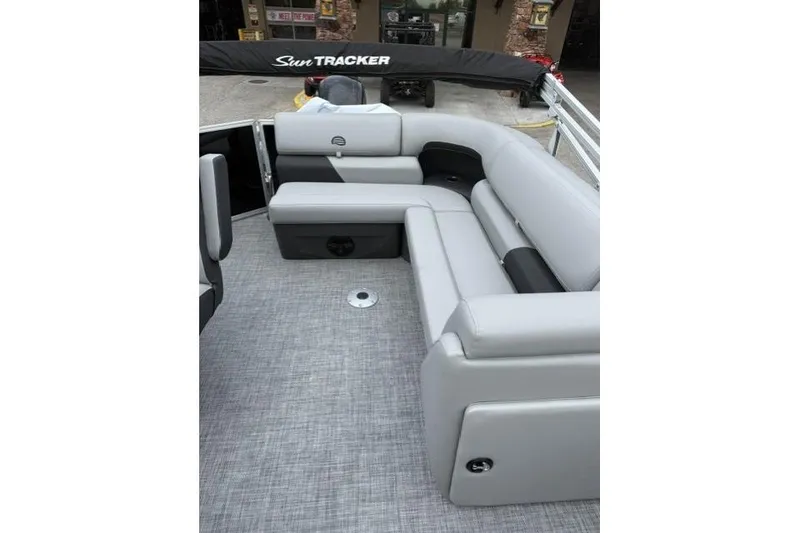 Slide: The Image of 2026 Sun Tracker Party Barge 20 DLX with gray seating and spacious deck layout. - 7