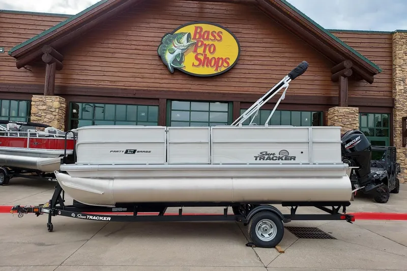 The Image of 2026 Sun Tracker Party Barge 18 DLX pontoon boat at Bass Pro Shops. - 0