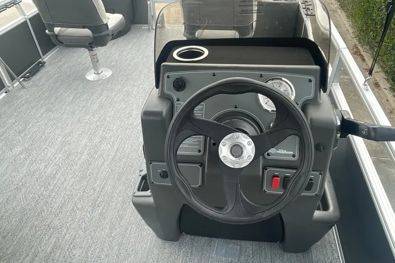 Slide: The Image of Steering console of 2026 Sun Tracker Bass Buggy 18 DLX pontoon boat. - 13