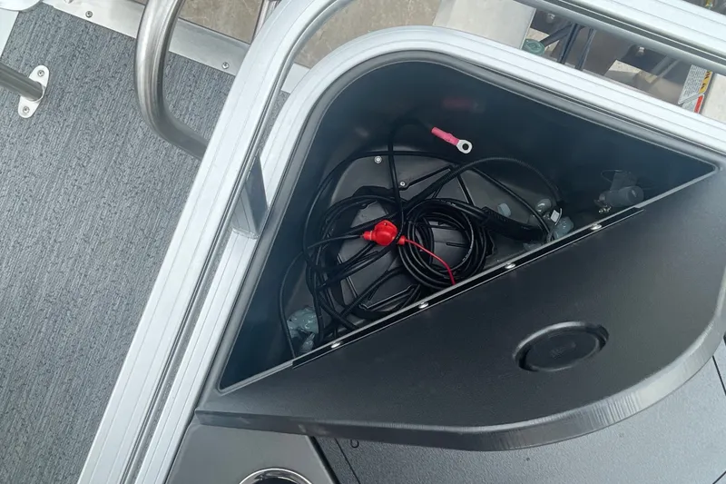 Slide: The Image of Storage compartment with wiring in 2026 Sun Tracker Bass Buggy 18 DLX boat. - 19