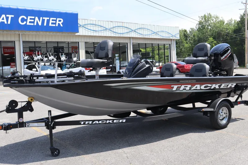 Slide: The Image of 2026 Tracker Pro Team 175 Crappie Edition boat displayed at dealership. - 12