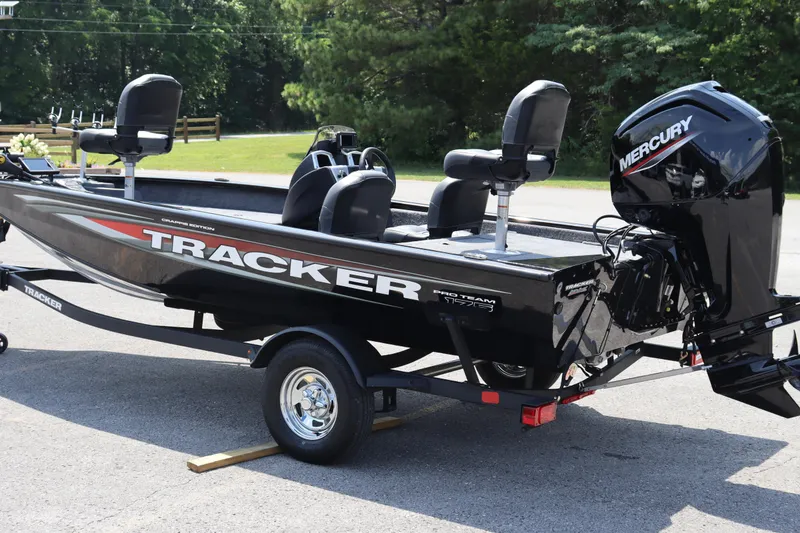 The Image of 2026 Tracker Pro Team 175 Crappie Edition boat with Mercury engine on trailer. - 0
