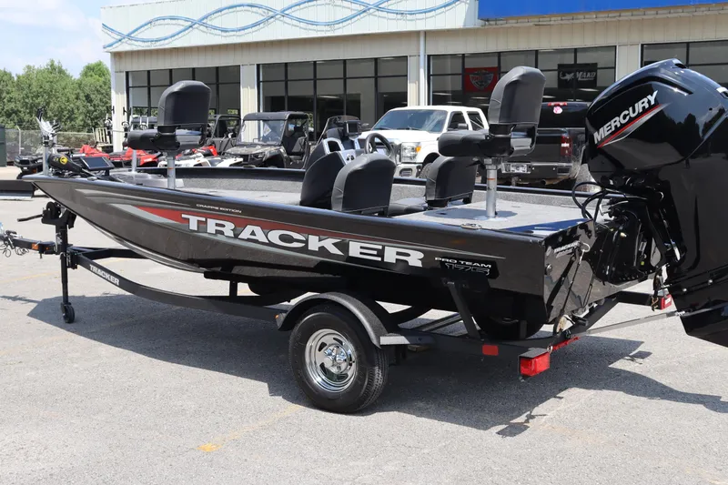 Slide: The Image of 2026 Tracker Pro Team 175 Crappie Edition boat with Mercury engine on trailer. - 10