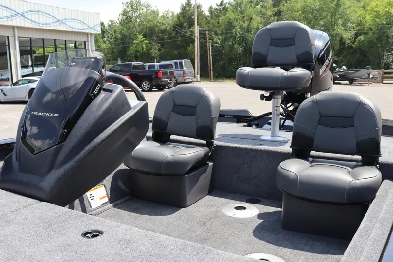 Slide: The Image of 2026 Tracker Pro Team 175 Crappie Edition boat interior with seating and console. - 18