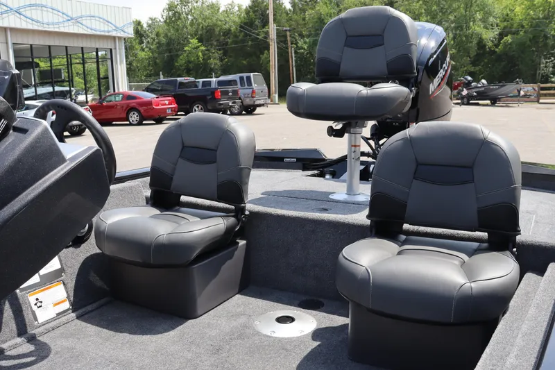 Slide: The Image of 2026 Tracker Pro Team 175 Crappie Edition boat with three cushioned seats. - 17