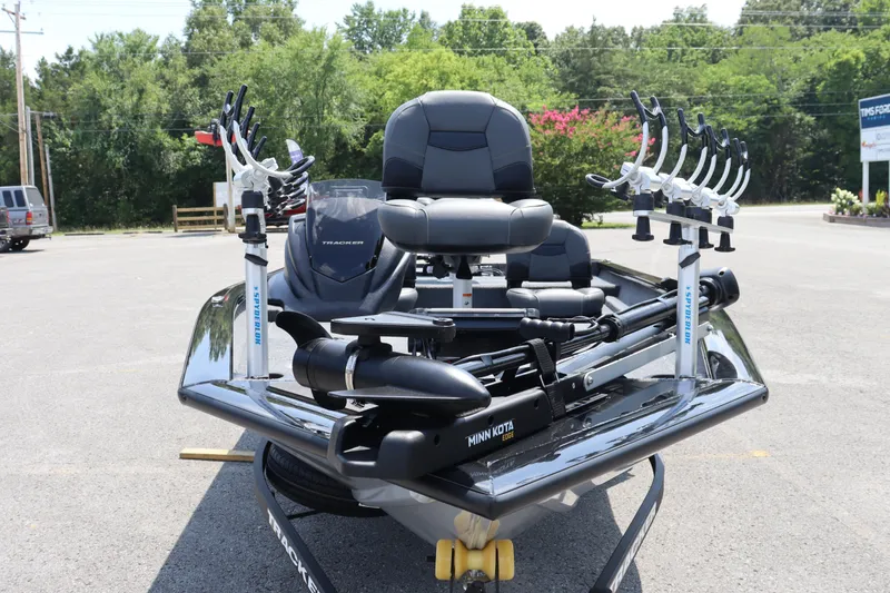 Slide: The Image of 2026 Tracker Pro Team 175 Crappie Edition fishing boat with rod holders and Minn Kota motor. - 13