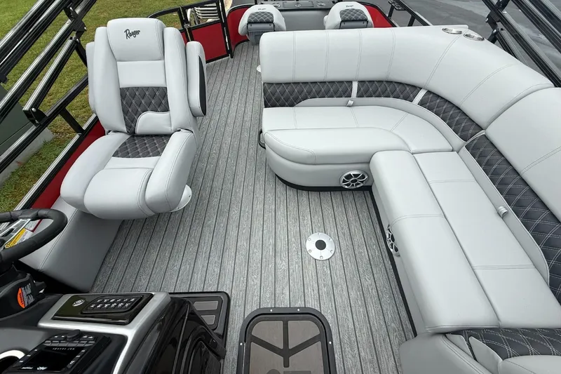 Slide: The Image of Luxurious interior of 2026 Ranger 223F boat with plush seating and modern design. - 8