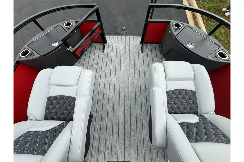 Slide: The Image of Luxurious seating on 2026 Ranger 223F boat with stylish upholstery and cup holders. - 9